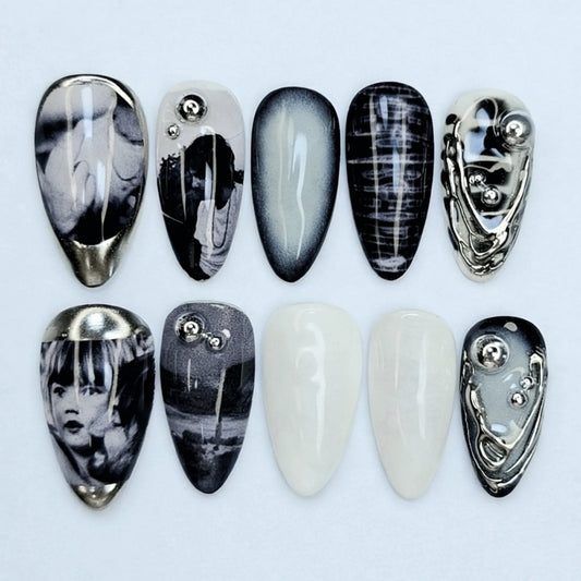 Noir Surrealism Chrome Nails